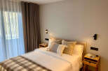 Experience comfort and style in this inviting bedroom.