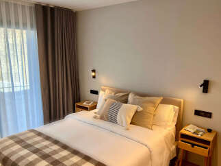 Experience comfort and style in this inviting bedroom.
