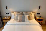 Experience the epitome of comfort and style in this beautifully designed bedroom.