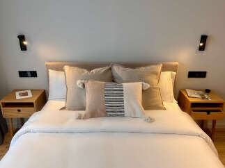 Experience the epitome of comfort and style in this beautifully designed bedroom.