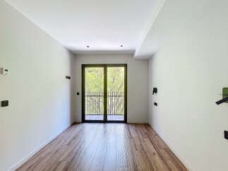 This stunning property boasts a bright and airy interior with large windows offering ample natural light.