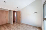Step into this beautifully designed space, featuring stunning wooden floors and elegant wooden doors.