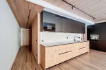 This modern kitchen boasts sleek design and functionality.