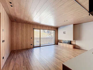 Experience modern luxury in this stunning property, featuring exquisite wood paneling and flooring that exudes warmth and sophistication.