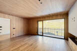 Step into modern elegance with this stunning property, featuring exquisite wood paneling throughout.