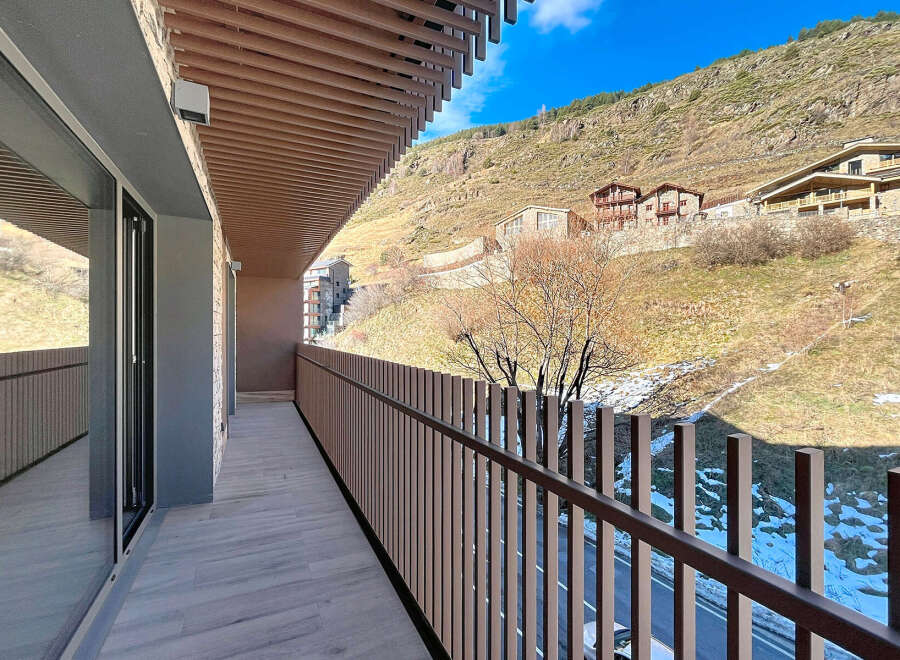 Enjoy breathtaking mountain views from this stunning balcony.