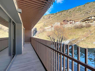 Enjoy breathtaking mountain views from this stunning balcony.