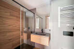 Step into modern elegance with this stunning bathroom design.
