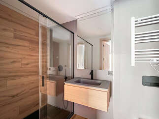 Step into modern elegance with this stunning bathroom design.