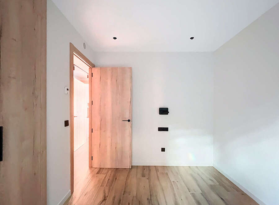 This stunning property boasts a modern interior with a focus on natural light and elegant design.