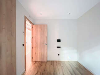This stunning property boasts a modern interior with a focus on natural light and elegant design.