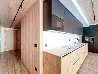 This modern kitchen boasts sleek design and functionality.