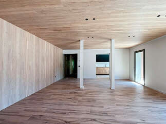 Step into a modern marvel with this stunning property, showcasing exquisite wooden accents throughout.