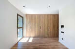 This stunning property boasts a modern interior with a focus on natural materials.