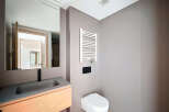 This modern bathroom features a sleek design with a minimalist aesthetic.