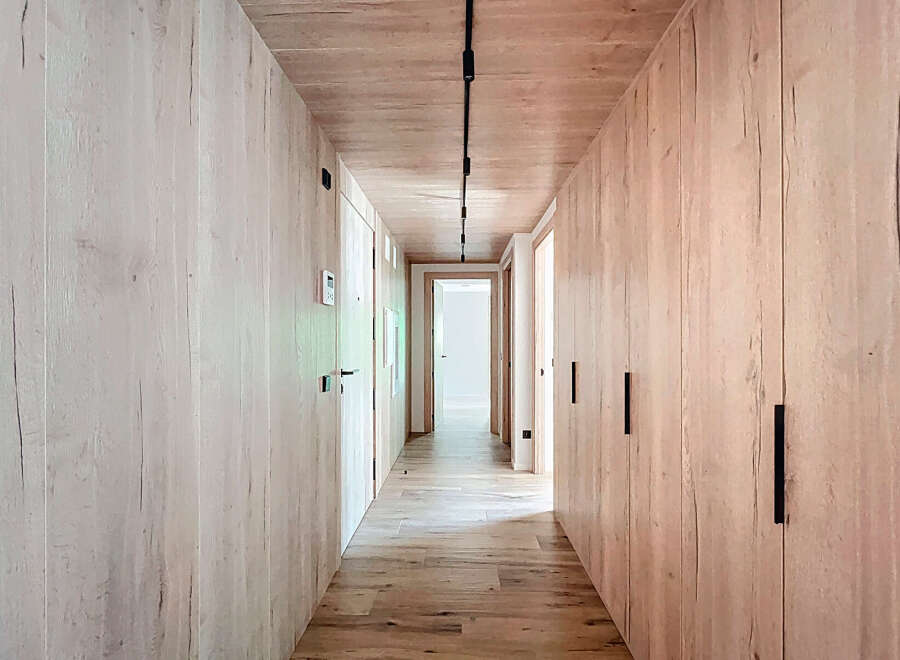 Step into a world of refined elegance with this stunning hallway design.