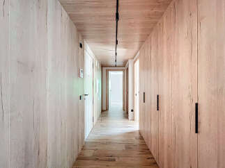 Step into a world of refined elegance with this stunning hallway design.
