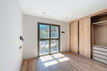 This stunning property boasts a modern design with ample natural light.