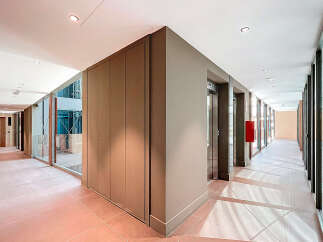 Step into luxury with this stunning property featuring a modern hallway design.