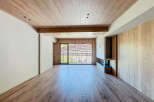 This stunning property boasts an open-plan living area with large windows offering breathtaking views.