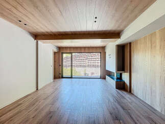 This stunning property boasts an open-plan living area with large windows offering breathtaking views.