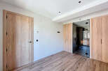 This stunning property boasts a spacious and bright interior with high-quality wooden flooring and doors.