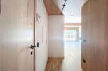 This stunning apartment boasts a spacious open-plan living area with large windows offering breathtaking views.