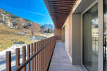 Enjoy breathtaking mountain views from this stunning balcony.