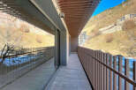 Enjoy breathtaking mountain views from this stunning balcony.