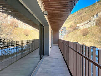 Enjoy breathtaking mountain views from this stunning balcony.
