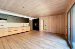 This stunning modern kitchen boasts sleek cabinetry, a minimalist design, and high-end appliances.