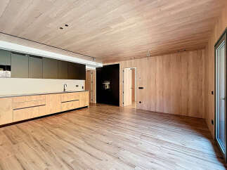 This stunning modern kitchen boasts sleek cabinetry, a minimalist design, and high-end appliances.
