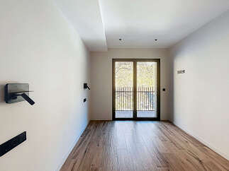 Discover the elegance of this modern property, featuring a bright and airy interior with sleek design elements.