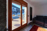 This stunning property boasts breathtaking mountain views from its large windows and private balcony.