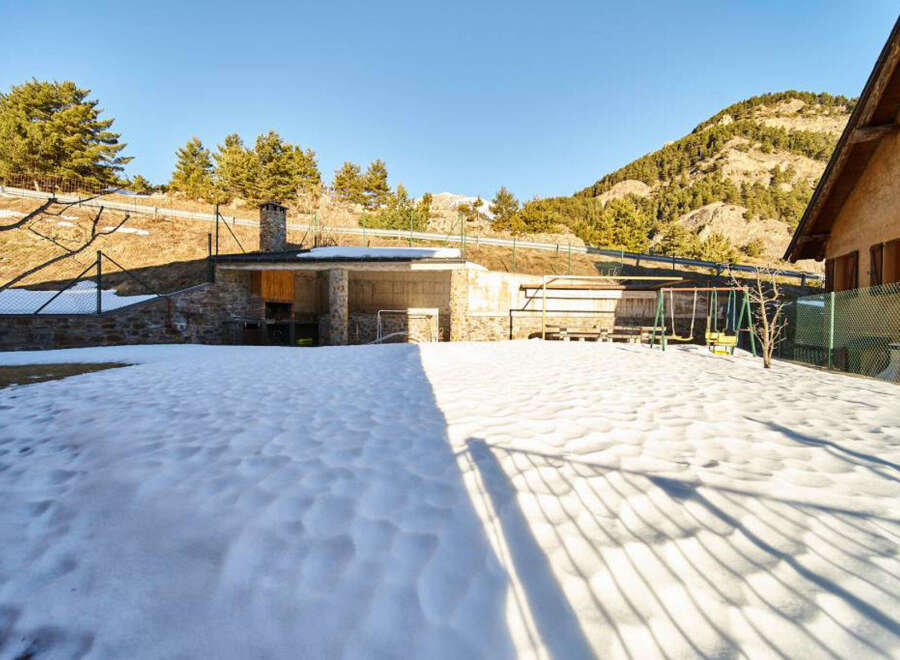 This stunning property boasts a spacious backyard perfect for outdoor entertainment, complete with a built-in BBQ area and a children's playground.