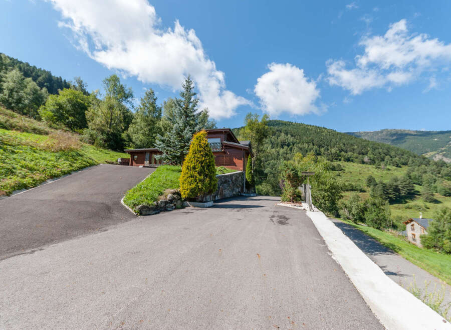 Mountain chalet with stunning views and private driveway.
