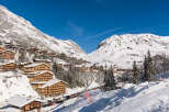 Nestled in the heart of the French Alps, this stunning chalet offers breathtaking views of snow-capped mountains and a charming village.