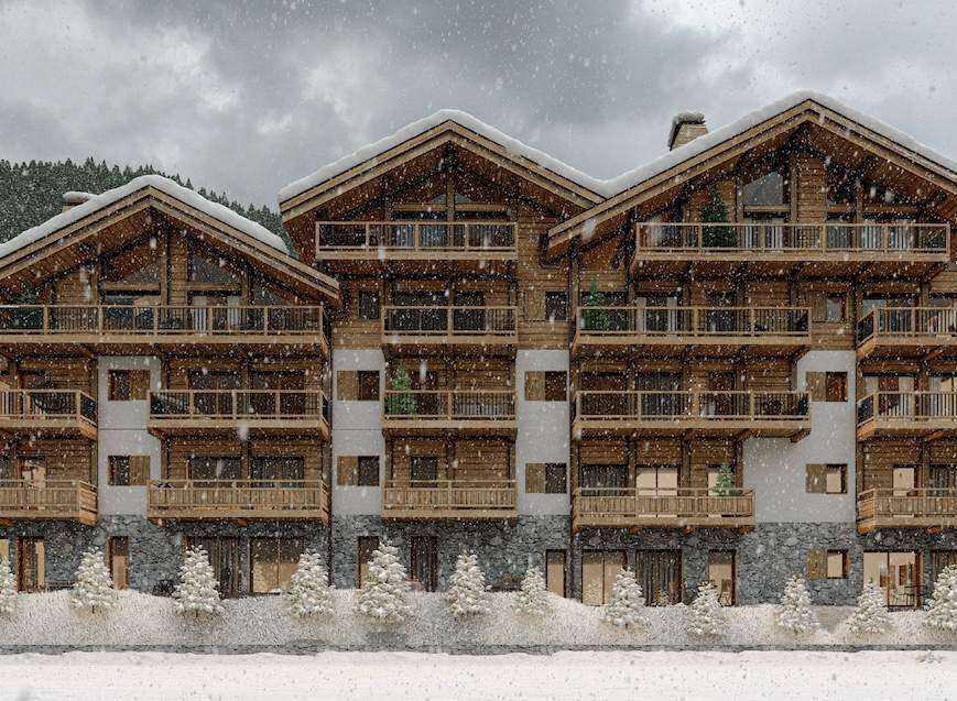 Luxury chalet-style apartments in a stunning snowy mountain setting.