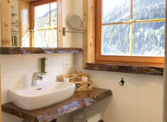 Experience rustic charm in this beautifully designed bathroom.