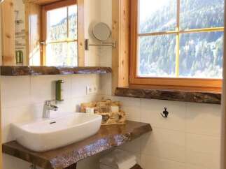 Experience rustic charm in this beautifully designed bathroom.