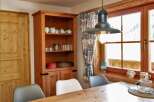 This charming property boasts a cozy dining area, perfect for enjoying meals with loved ones.