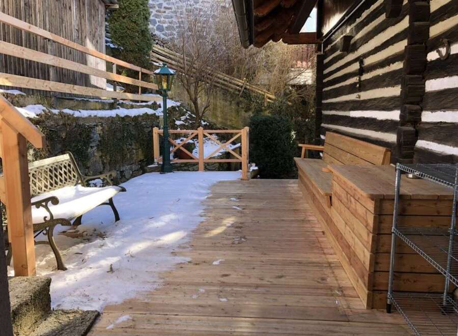 Discover the charm of this unique property, featuring a cozy outdoor space perfect for relaxation.