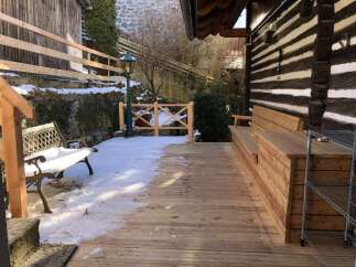 Discover the charm of this unique property, featuring a cozy outdoor space perfect for relaxation.