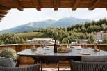 Enjoy breathtaking mountain views from this luxurious balcony.