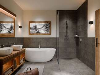 This luxurious bathroom features a modern design with a touch of rustic charm.