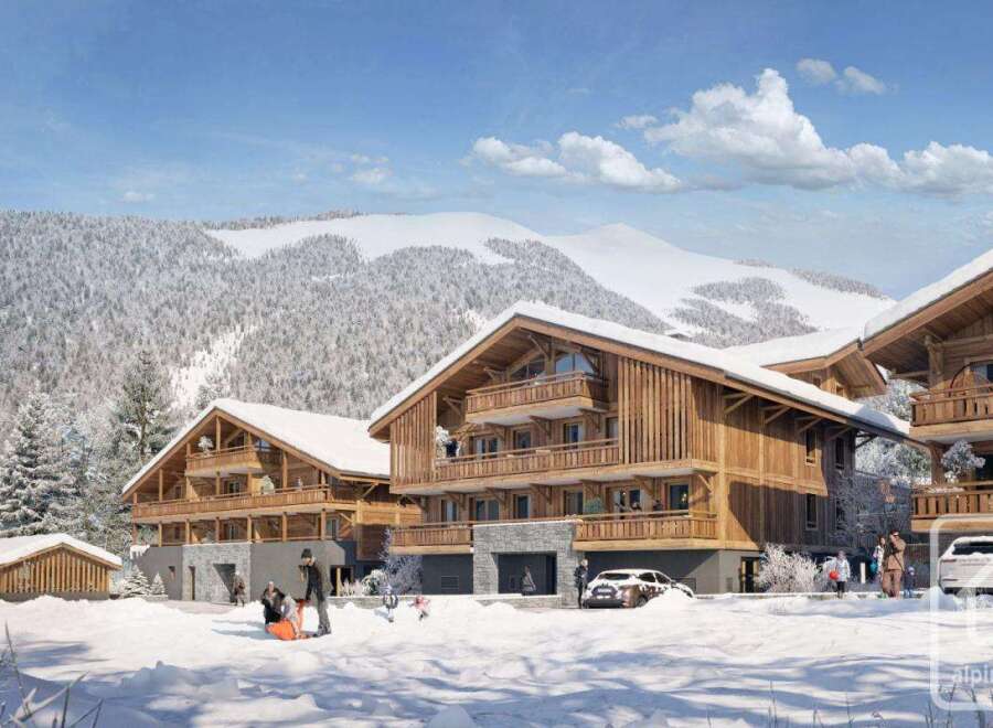 Discover luxury living in this stunning chalet, nestled in a picturesque snowy landscape.