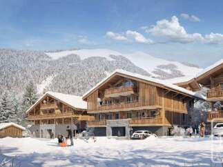 Discover luxury living in this stunning chalet, nestled in a picturesque snowy landscape.