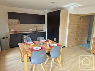 Discover this modern kitchen and dining area, perfect for entertaining or everyday living.