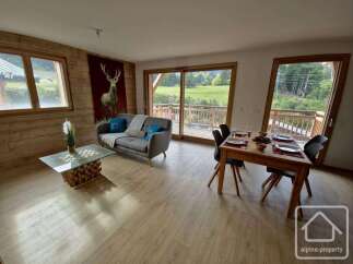 Discover the charm of this stunning property, featuring a cozy living area with a comfortable sofa and a unique coffee table.