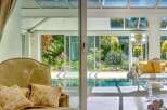 Luxurious villa with a stunning indoor pool and conservatory.